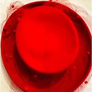 Two vintage hats: Red with veil. Black, beret style with rhinestones, feather